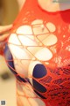 A close up of a mannequin wearing a red and blue dress.